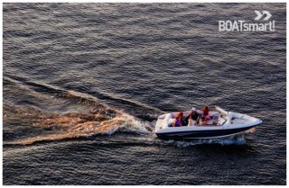 A motorboat in a lake.