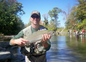 Scott with a nice steelhead caught from Elk Creek in October 2010