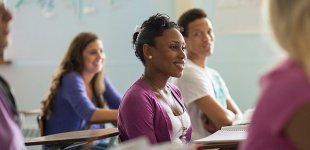 Students sitting in a classroom.