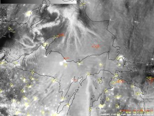 Suomi NPP VIIRS 0.7 Âµm Day/Night Band image, with RTMA surface winds